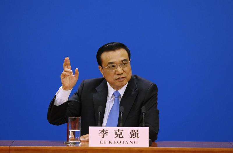 3月15日，國務院總理李克強在北京人民大會堂與中外記者見面，并回答記者提問。 新華社記者 沈伯韓 攝